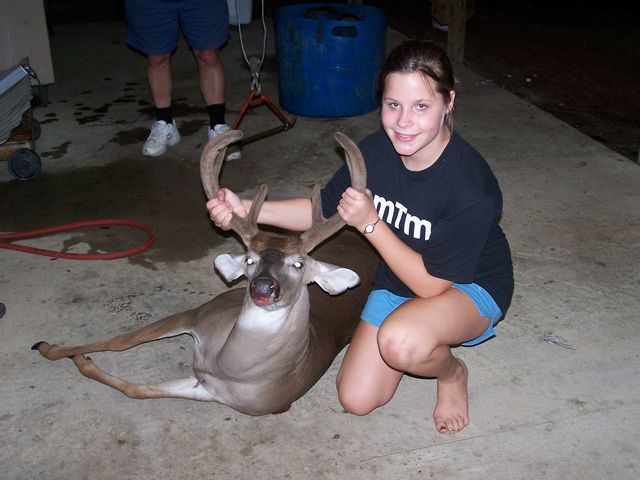 MY DOUGHTER KAYCIE W/ 1ST DEER